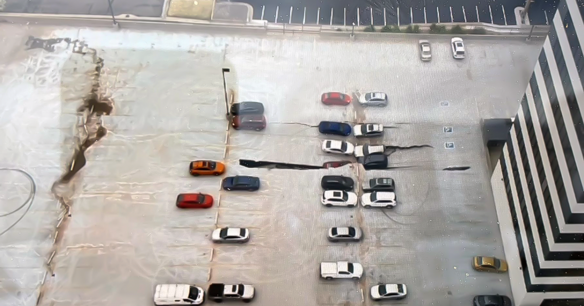 2 cars damaged in garage collapse at southeast Denver office building