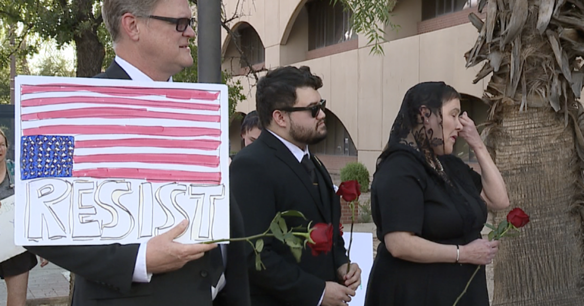 Demonstrators mourn “the death of due process” Demonstrators mourn “the death of due process”