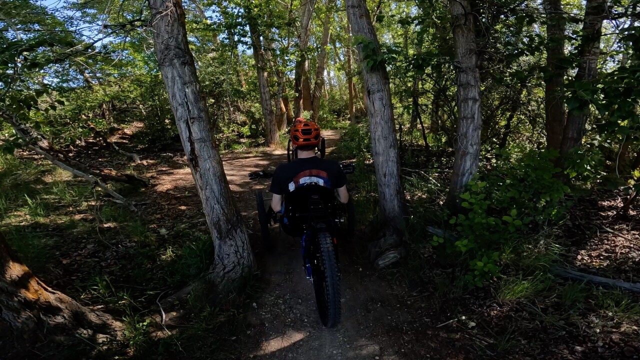 Riding through the trees on a trail in Military Reserve