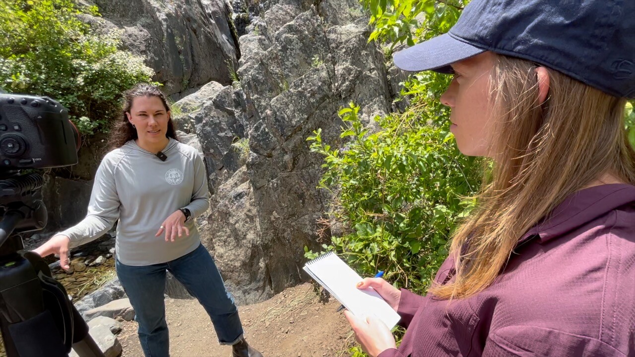 Stephanie Butzer and Brenna Cassidy, CPW's wolf monitoring and data coordinator