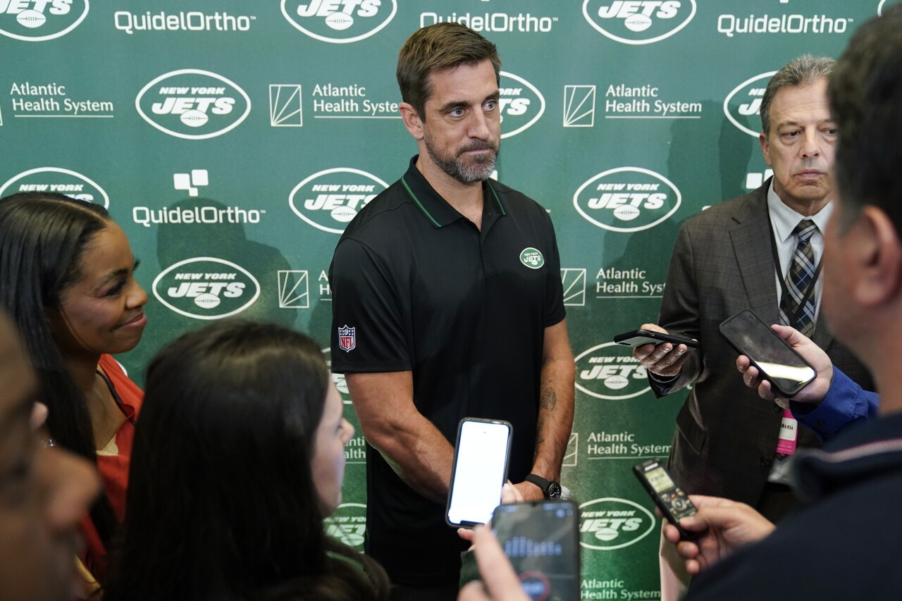 New York Jets QB Aaron Rodgers talks to reporters after introductory news conference, April 26, 2023