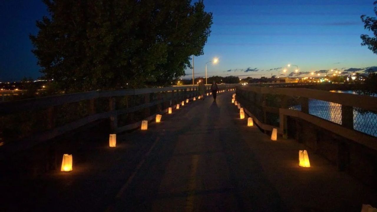 luminaria walk along the river's edge trail