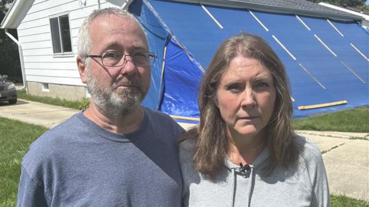 Mike, Cindy Damschen and other 16th Ave homeowners in West Bend are still in limbo after flood destruction earlier in August