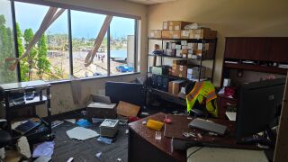 Storm damages office building in Menasha on 4th Street