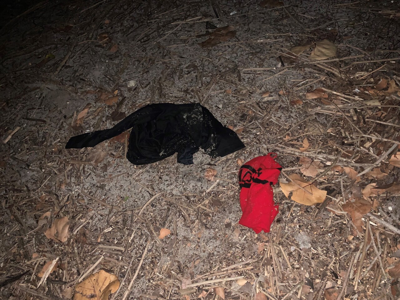 Some migrants left behind articles of clothing as they ran from the boat into Jupiter.
