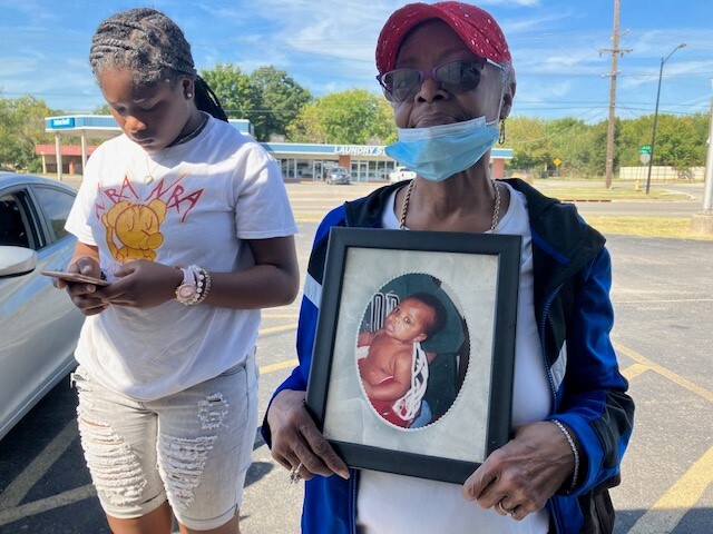 Deborah Yarbough holding a picture of Terron Yarbough