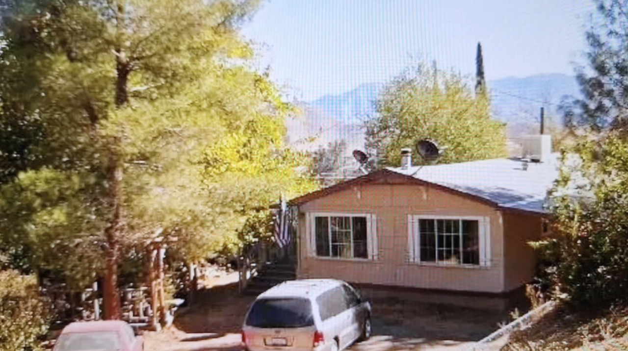 An older picture of Vietnam veteran Harold Everet Herbaugh's house before the damage