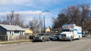 Billings Police Department Crime Scene Van parked outside a South Side residence on Thursday morning.jpeg