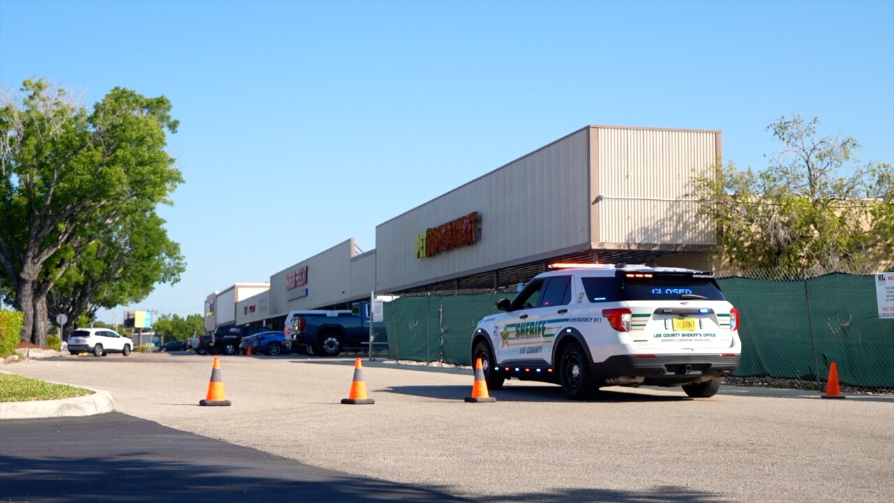 LCSO patrol car blocking the Big Lots parking lot with cones.