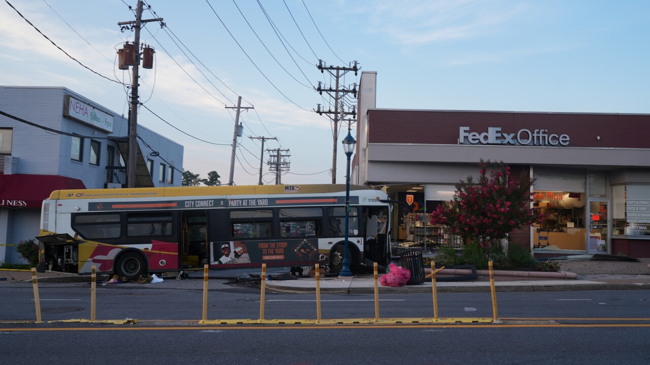 Mass casualty incident declared after bus crashes into Pikesville building, injuring 33 people