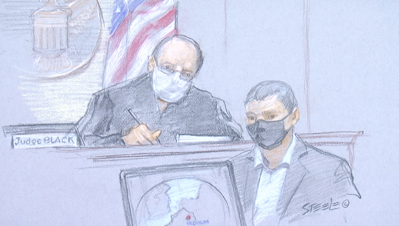 U.S. District Court Judge Timothy Black and a Belgian federal police chief inspector at the espionage trial of Yanjun Xu.