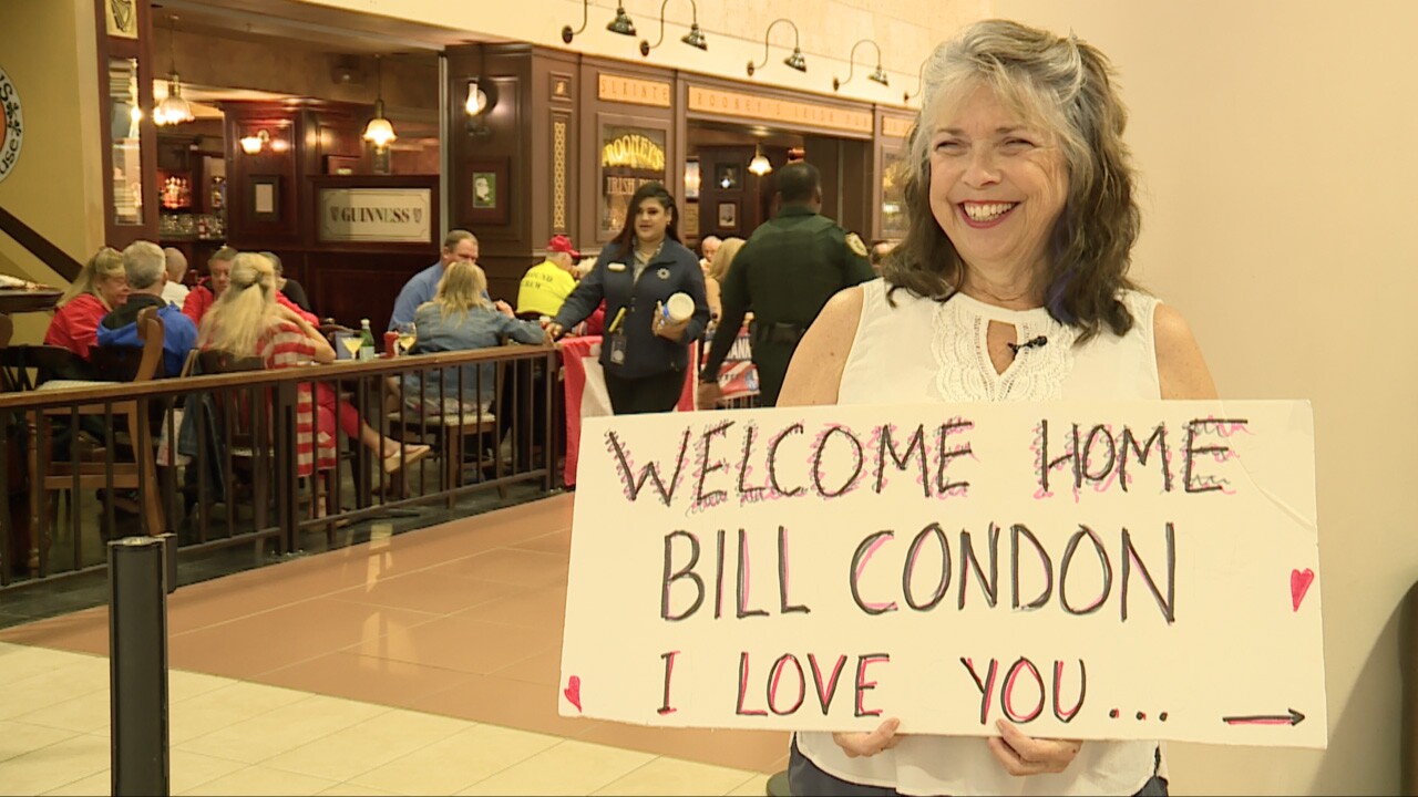 Heidi Condon welcomes veteran Bill Condon back from his Honor Flight at Palm Beach International Airport on Saturday, September 17, 2022.