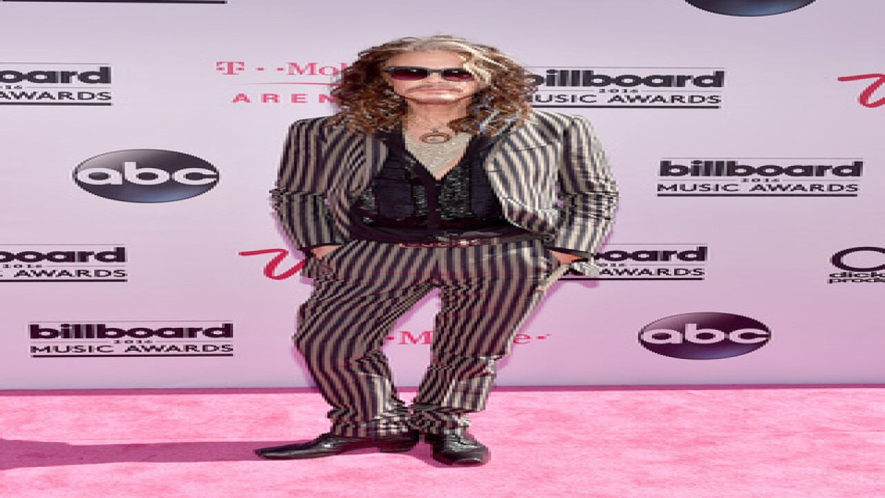See best, worst looks from BBMA magenta carpet