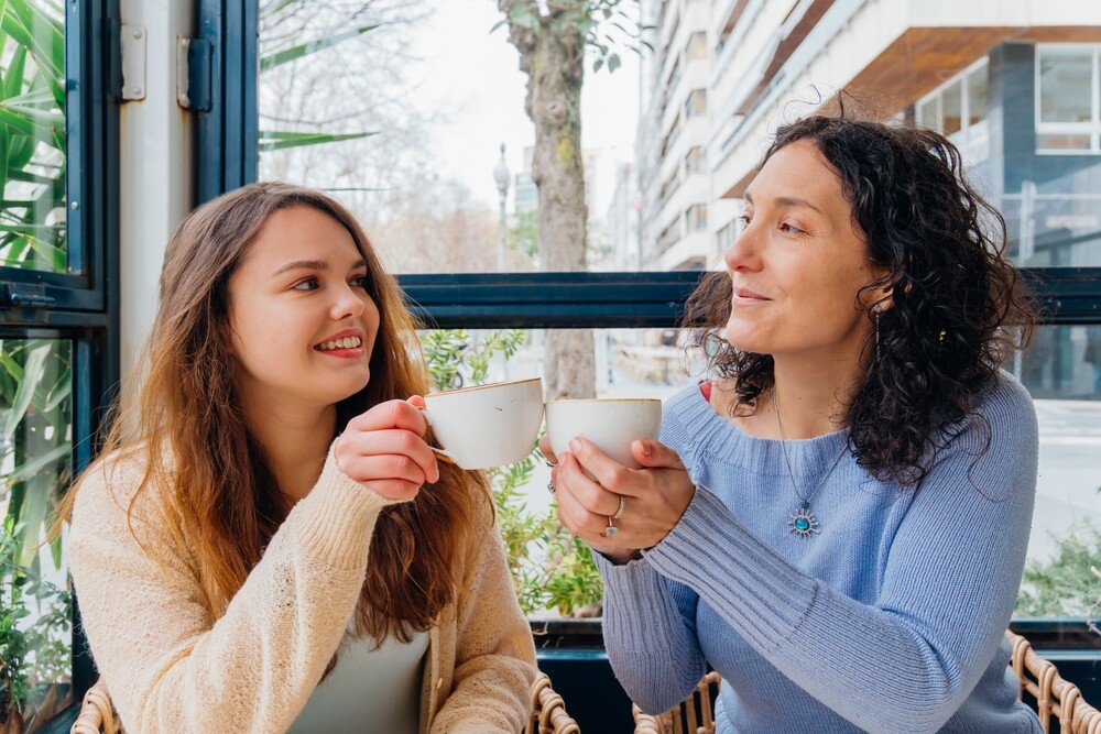 Mother,And,Daughter,Are,Enjoying,A,Relaxing,Moment,Together,,Sipping