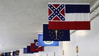The state flags on display along the tunnel between the Senate office building and the Capitol.