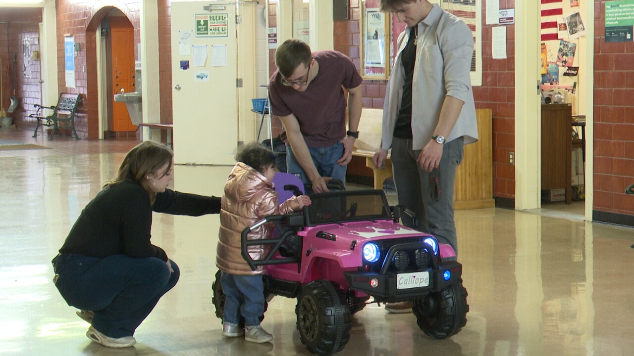 Career center students show Calliope the car