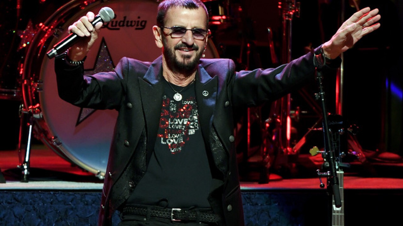 Beatles drummer Ringo Starr is knighted at Buckingham Palace