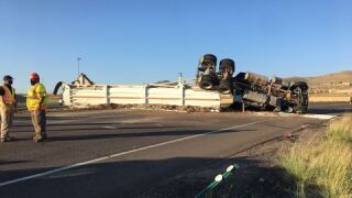 Semi rolls over after blowing tire_chicken manure on street
