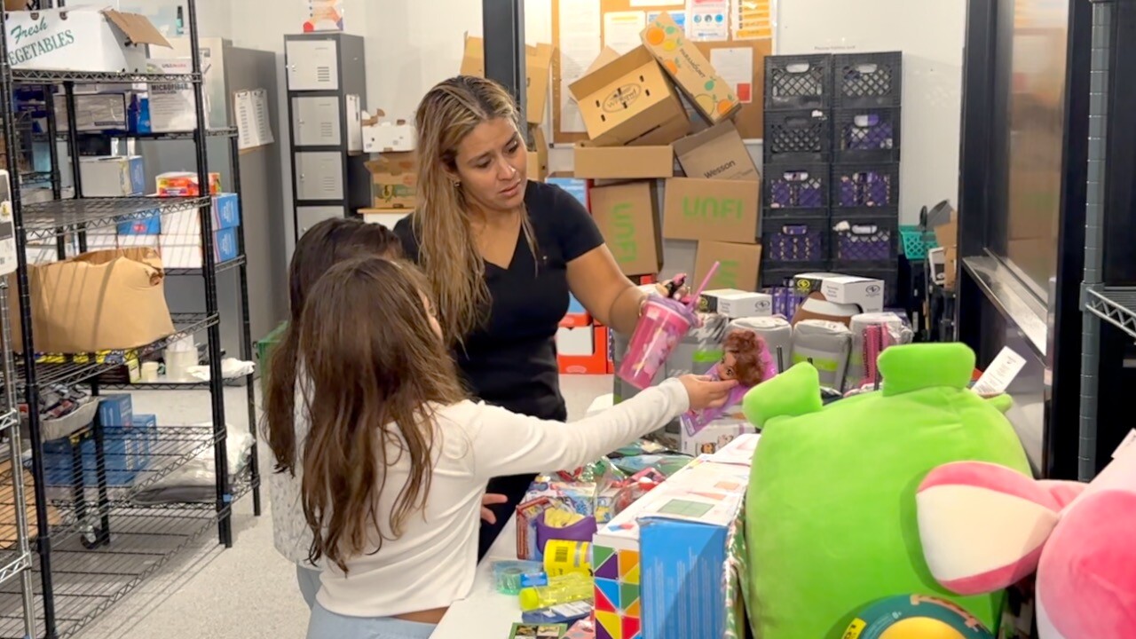 Family picking from the toy table