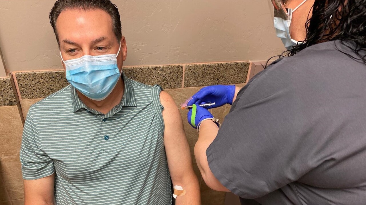 KGUN 9's Pat Parris receives his first COVID-19 vaccine trial injection.