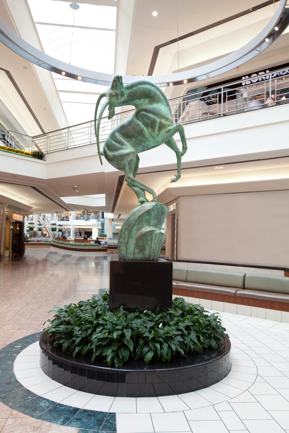 Leaping Gazelle by Marshall Fredericks – a bronze cast with green patina finish, bursting with the energy and beauty of an animal in motion.