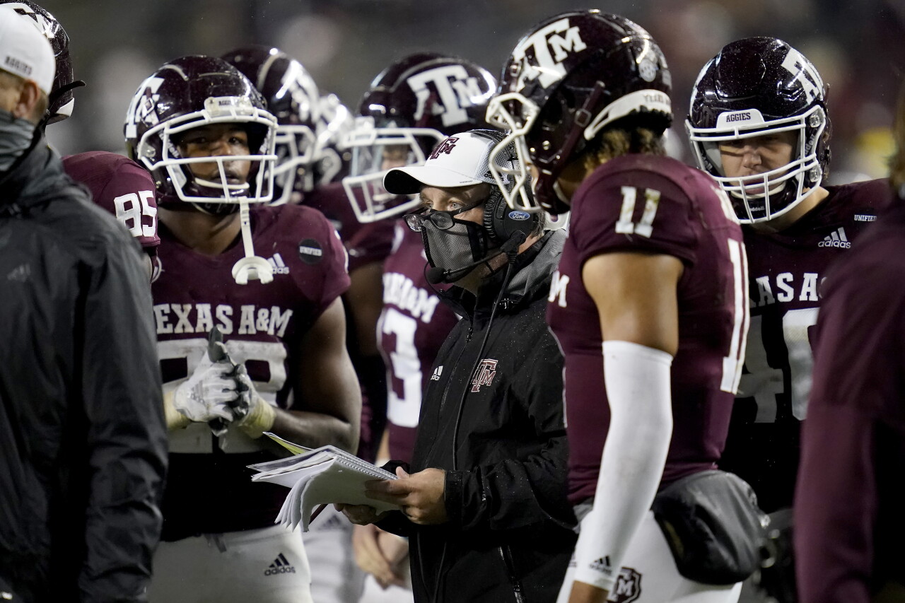Texas A&M Aggies head coach Jimbo Fisher talks to team during timeout in November 2020