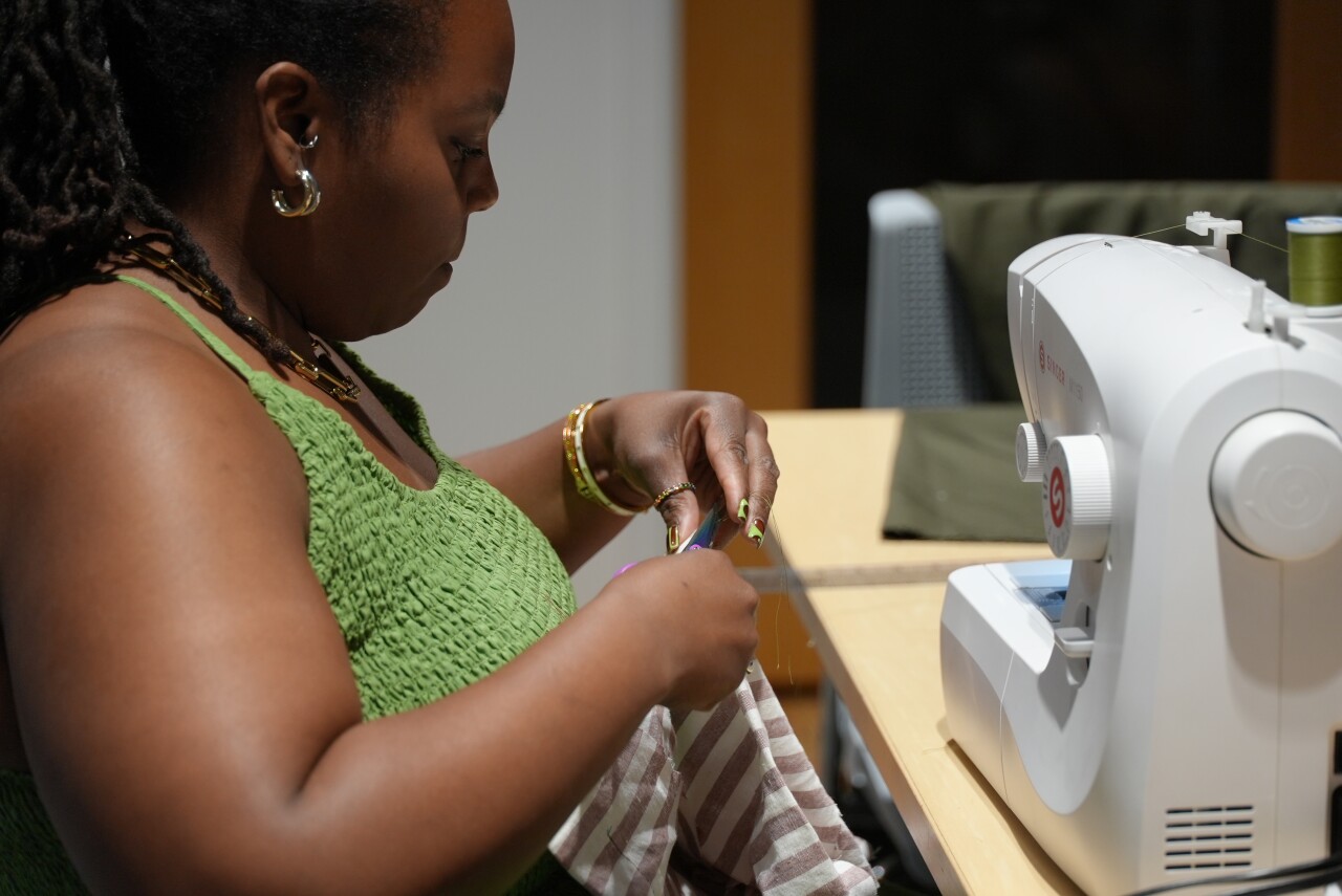 Shaunise working on her garment