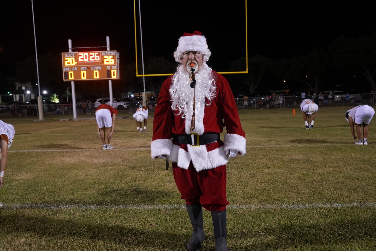 Alice strengh and conditioning coach Tinker Villarreal dressed as Santa Claus