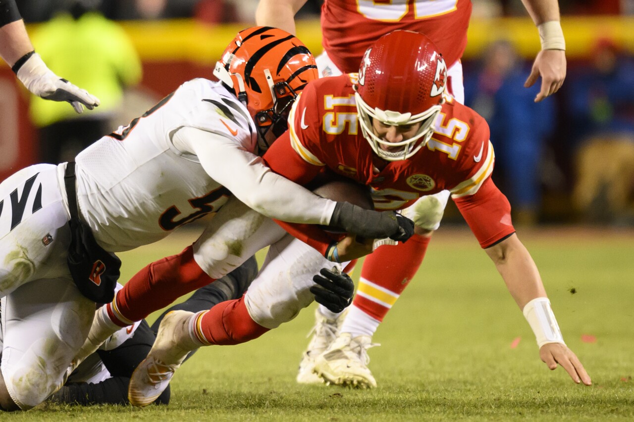 Kansas City Chiefs QB Patrick Mahomes tackled by Cincinnati Bengals linebacker Markus Bailey in AFC Championship game, Jan. 29, 2023