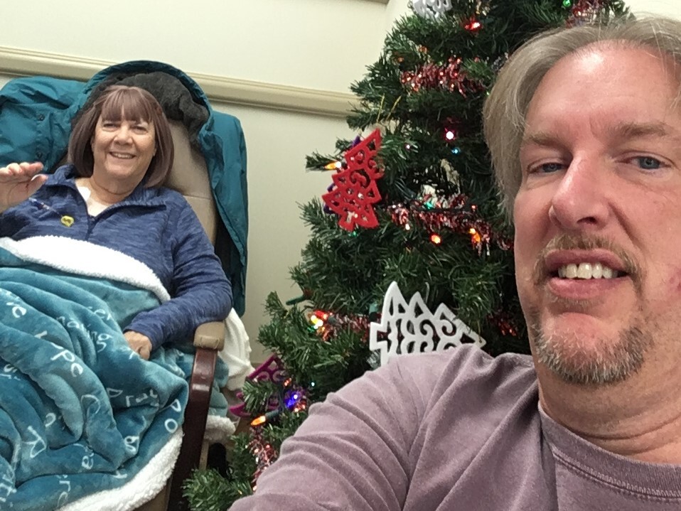 Scott Murphy, right, pictured with his sister, Linda, during one of her earliest chemotherapy treatments in late 2019.