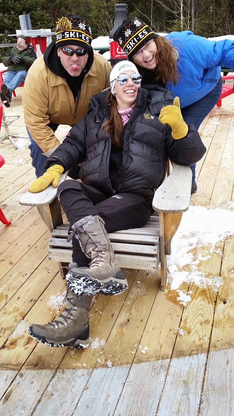 Deedra Irwin poses with her parents at the 2015 NCAA Nordic skiing championships