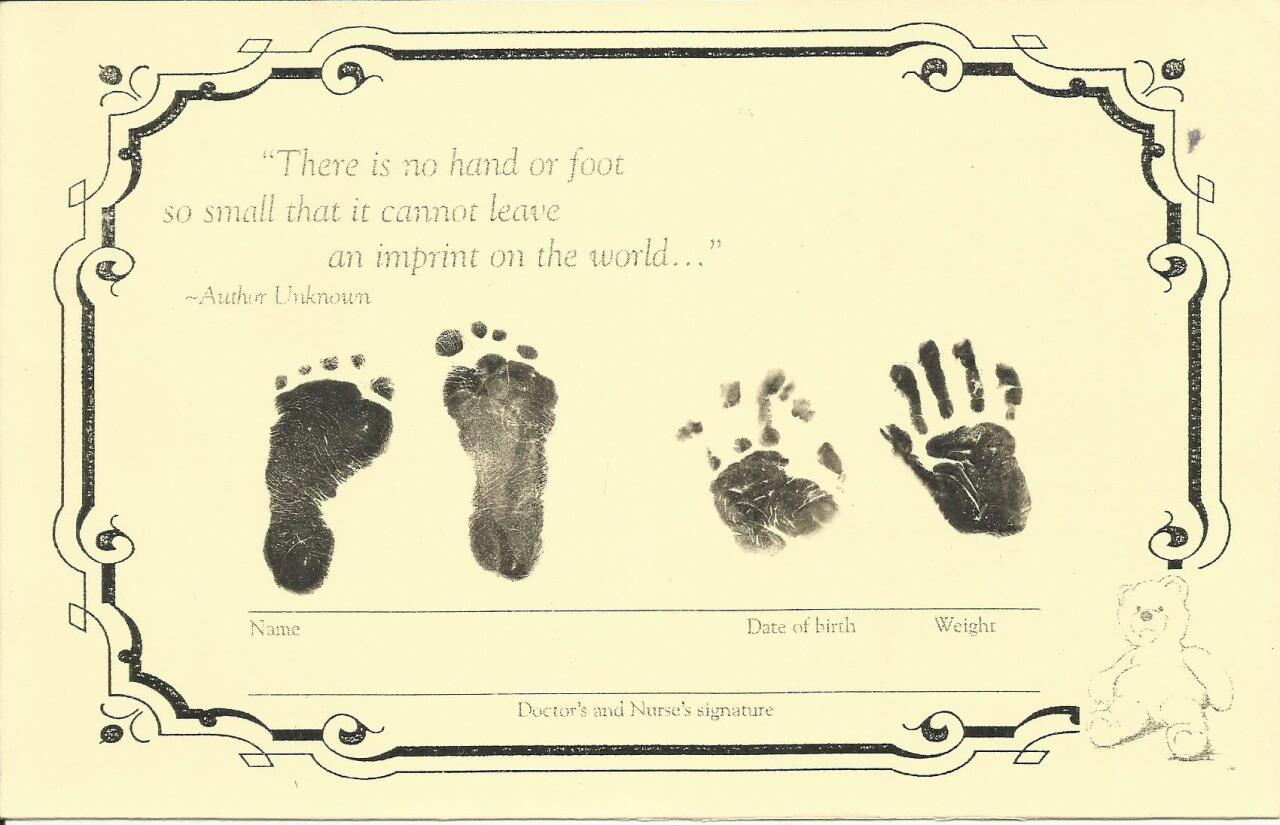 Petey hand and footprints.jpg