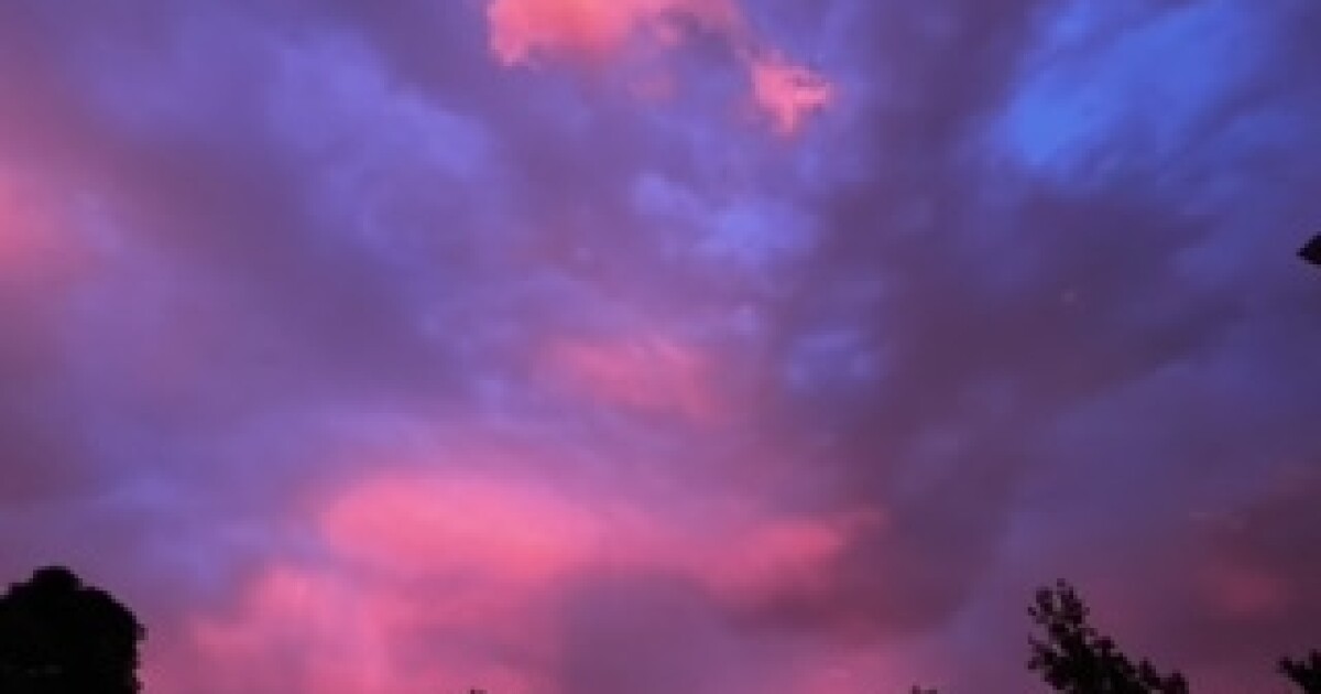 What causes the pink and purple sky?