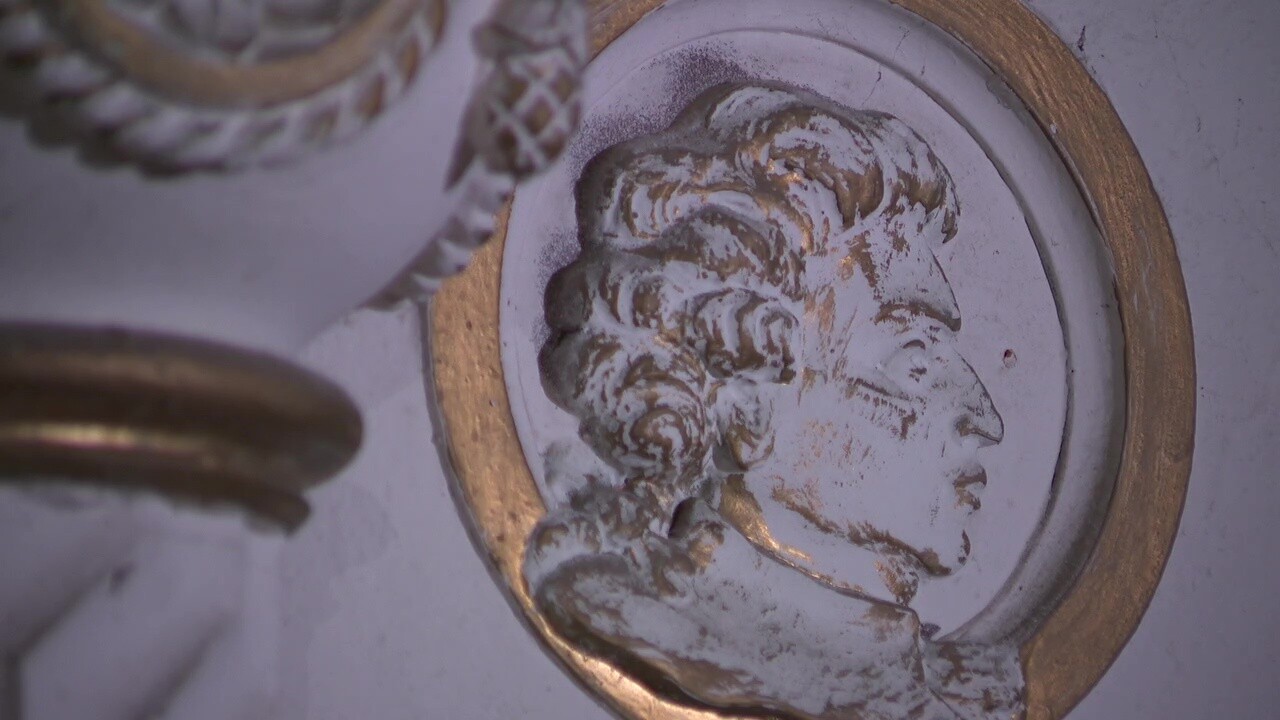 Ornate details adorn the walls inside the Moreland Theater.