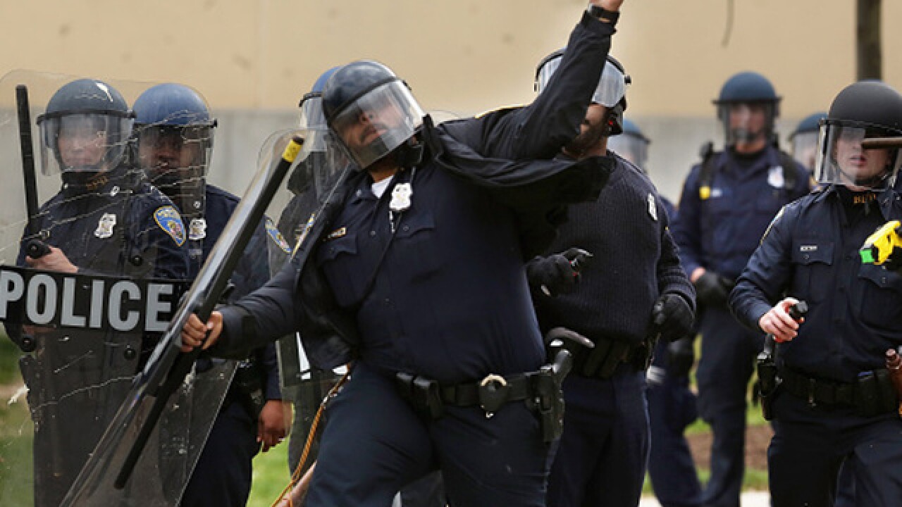 Protesters and police clash in Baltimore