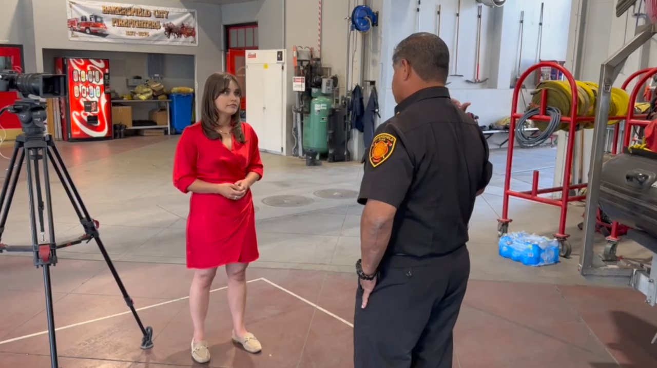 Senior Reporter Veronica Morley interviewing Battalion Chief Tim Ortiz