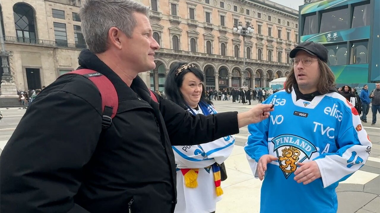 WPTV anchor Mike Trim interviews fans of Team Finland in Milan, Italy, on Feb. 10, 2026.