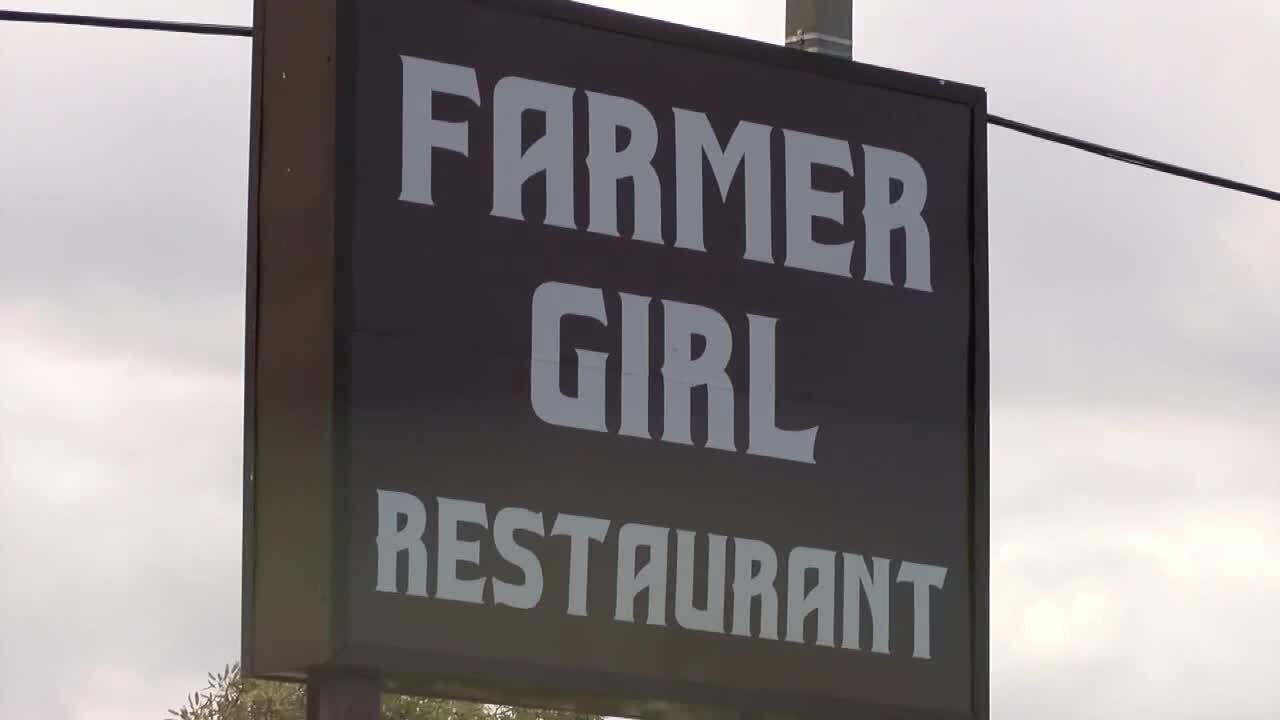 Farmer Girl Restaurant sign closeup