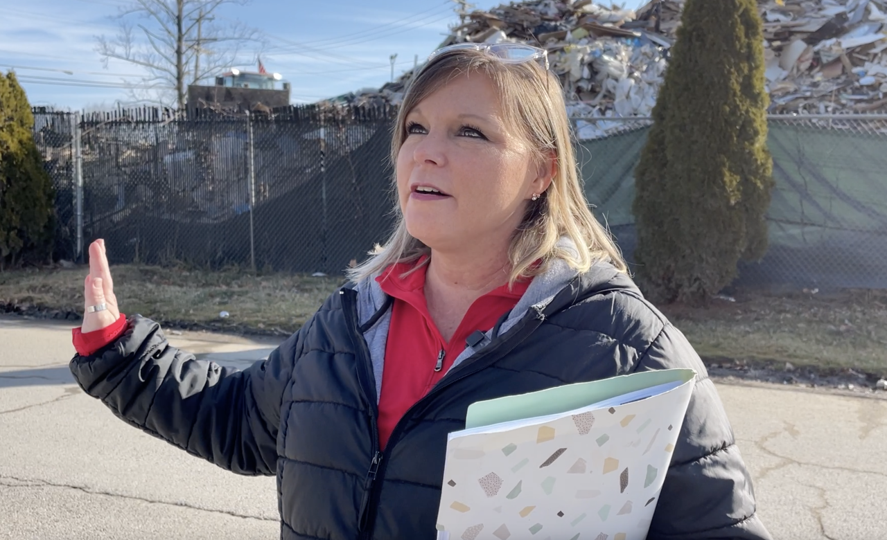 Tish Jones' family lives next to the mound of waste at a processing center in Sycamore Township