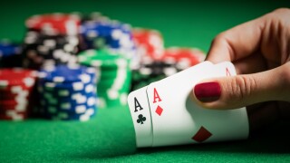 Person,Showing,Her,Deck,At,The,Poker,Game