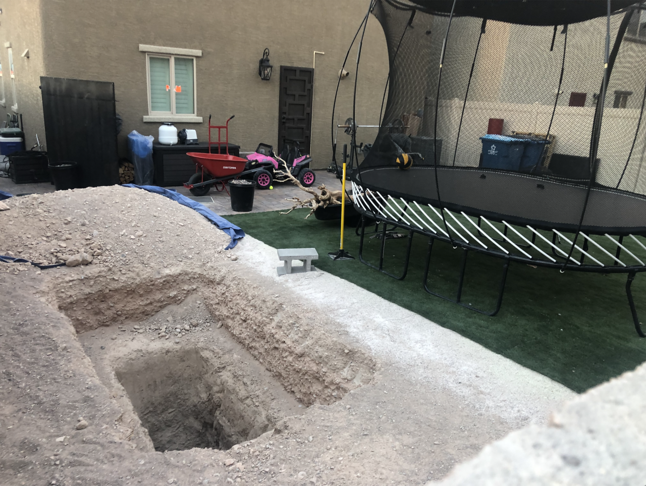 Hole in backyard of home where child's body found