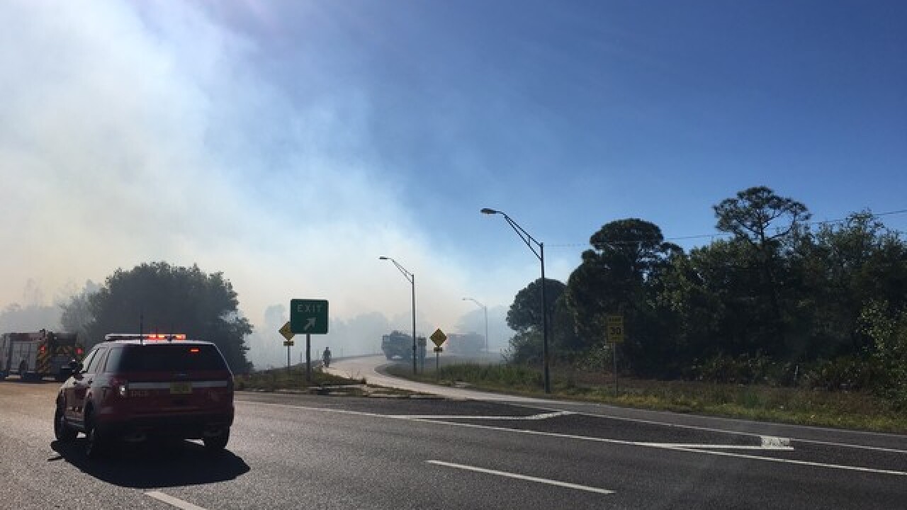 PHOTOS: Brush fire closes I-275 and Gand
