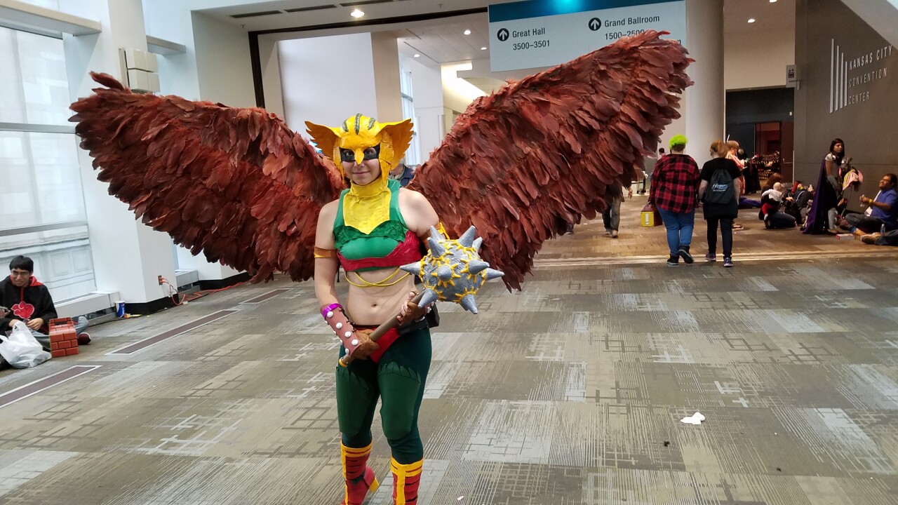 A cosplayer in full costume at the comicon