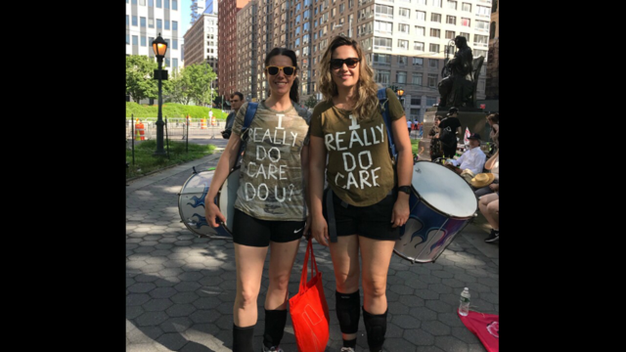 'I do care' shirts troll Melania Trump at immigration protests
