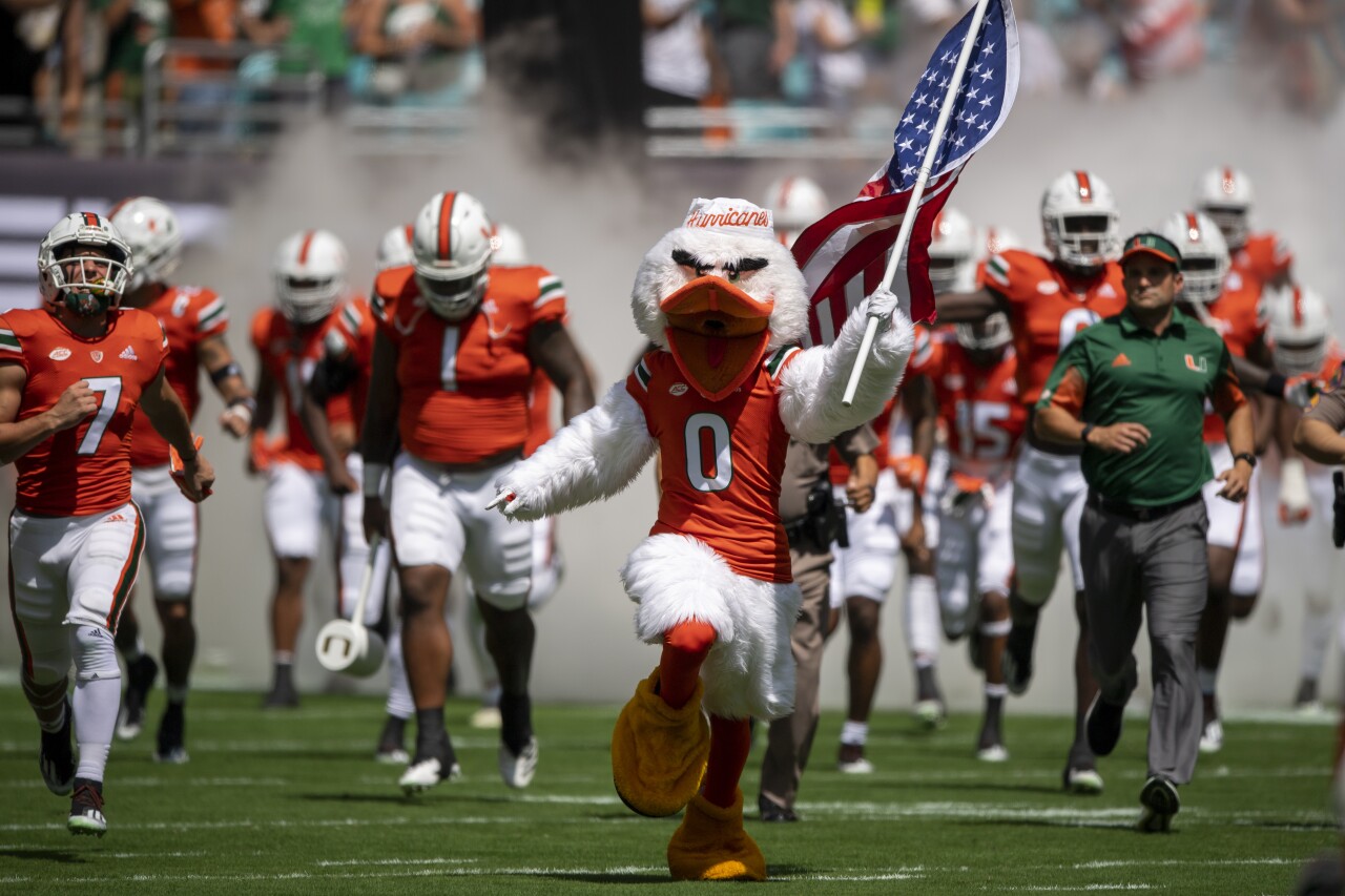 Sebastian the Ibis, Miami Hurricanes mascot, runs onto field before Michigan State Spartans game in 2021