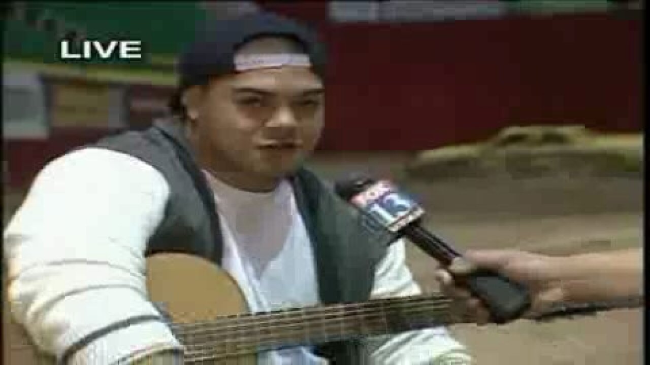 Musician Swiss plays for Big Budah