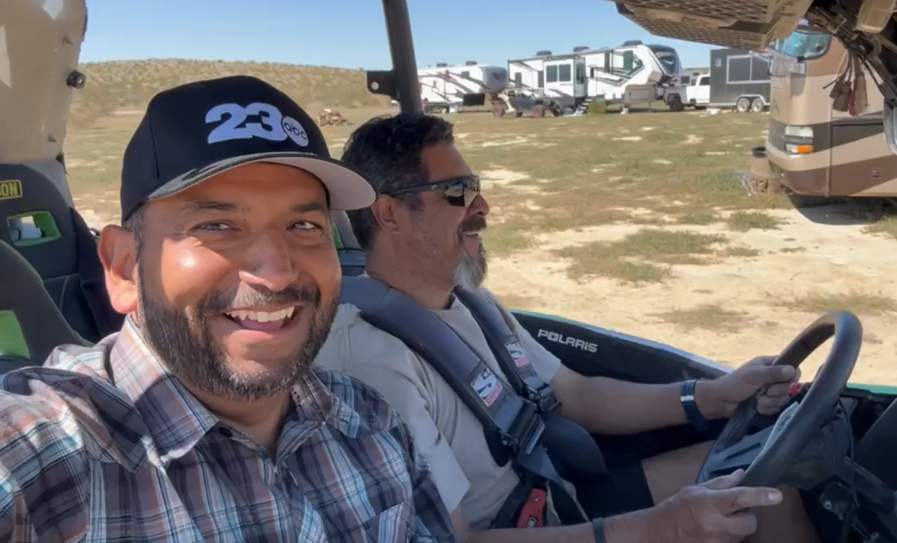 Neighborhood News Reporter Steve Virgen going on a practice run with event volunteer Frank DePina in California City