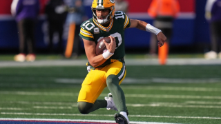 Green Bay Packers' Jordan Love runs during the first half of an NFL football game against the New York Giants Sunday, Nov. 16, 2025, in East Rutherford, N.J.