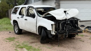 Victim's car remains in the family driveway in east Mesa