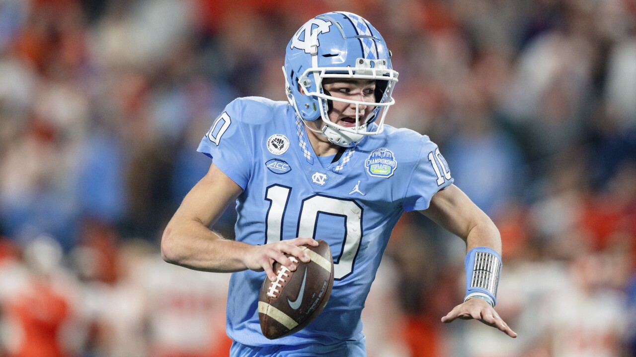 North Carolina Tar Heels QB Drake Maye runs with football against Clemson in 2022 ACC Championship
